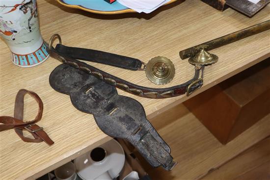 A group of horse brasses
